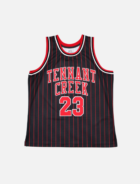 Menβs black and red basketball jersey featuring Tennant Creek and number 23