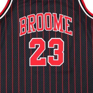 Menβs red and black basketball jersey featuring Broome and number 23